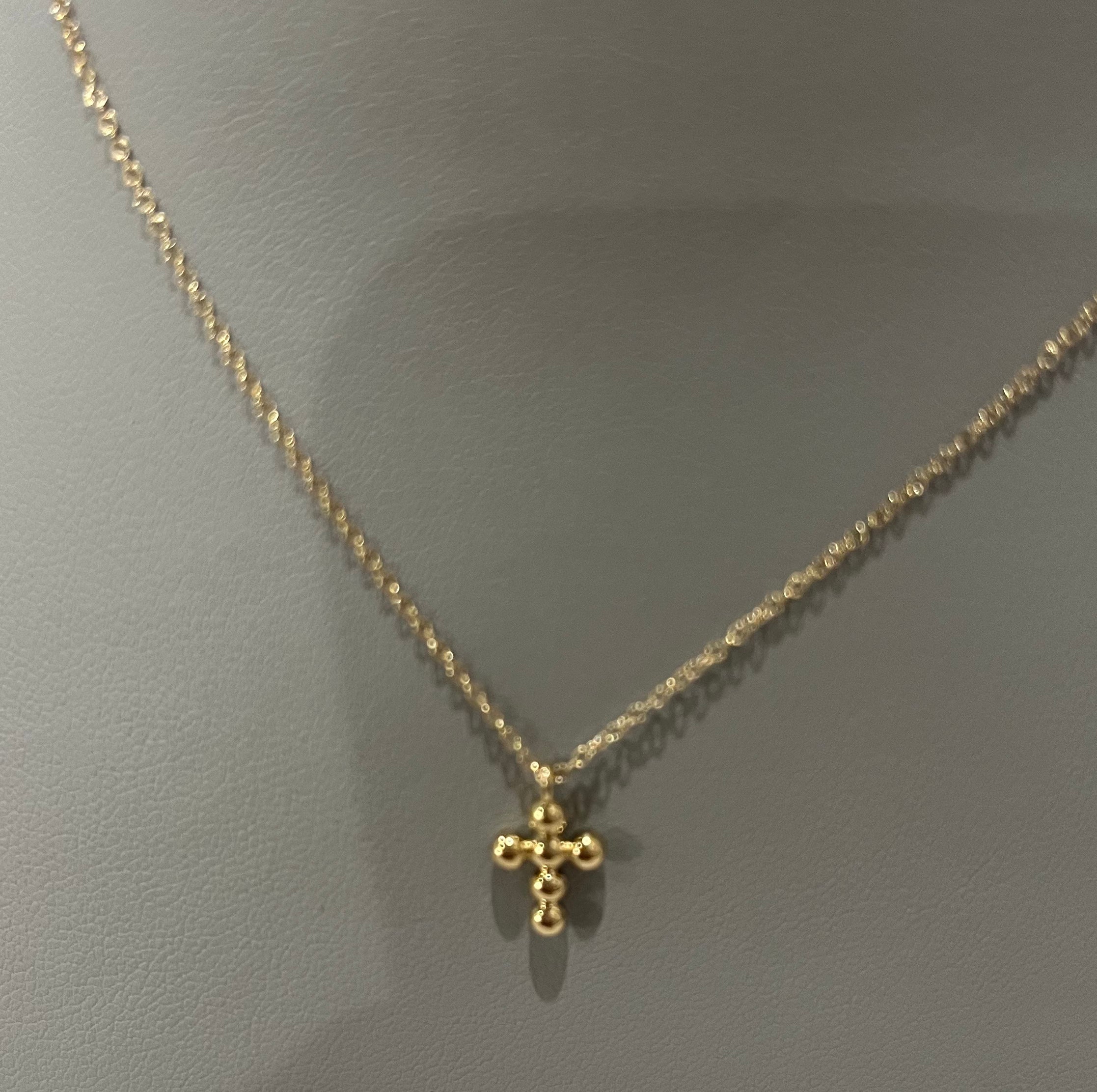 Bujukan Mini Beaded Cross Pendant