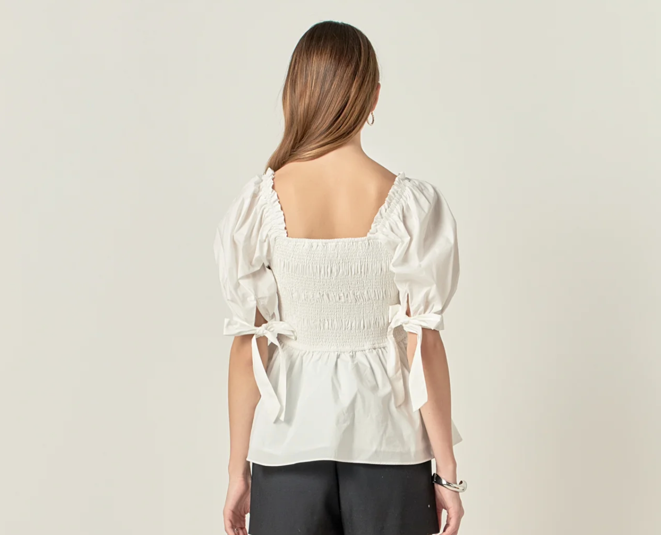 Smocked Bow Tie Peplum Top