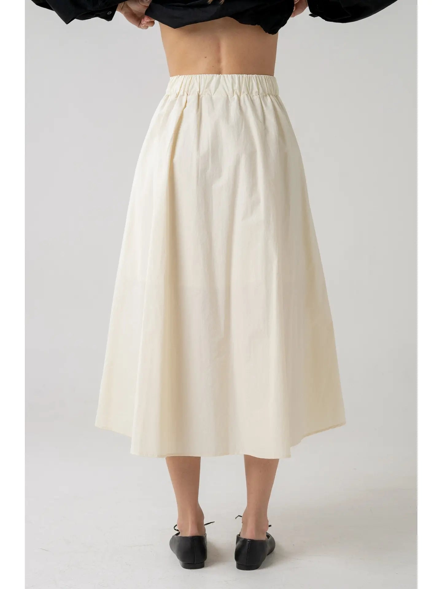 Pleated Midi Skirt with Asymmetrical Hem