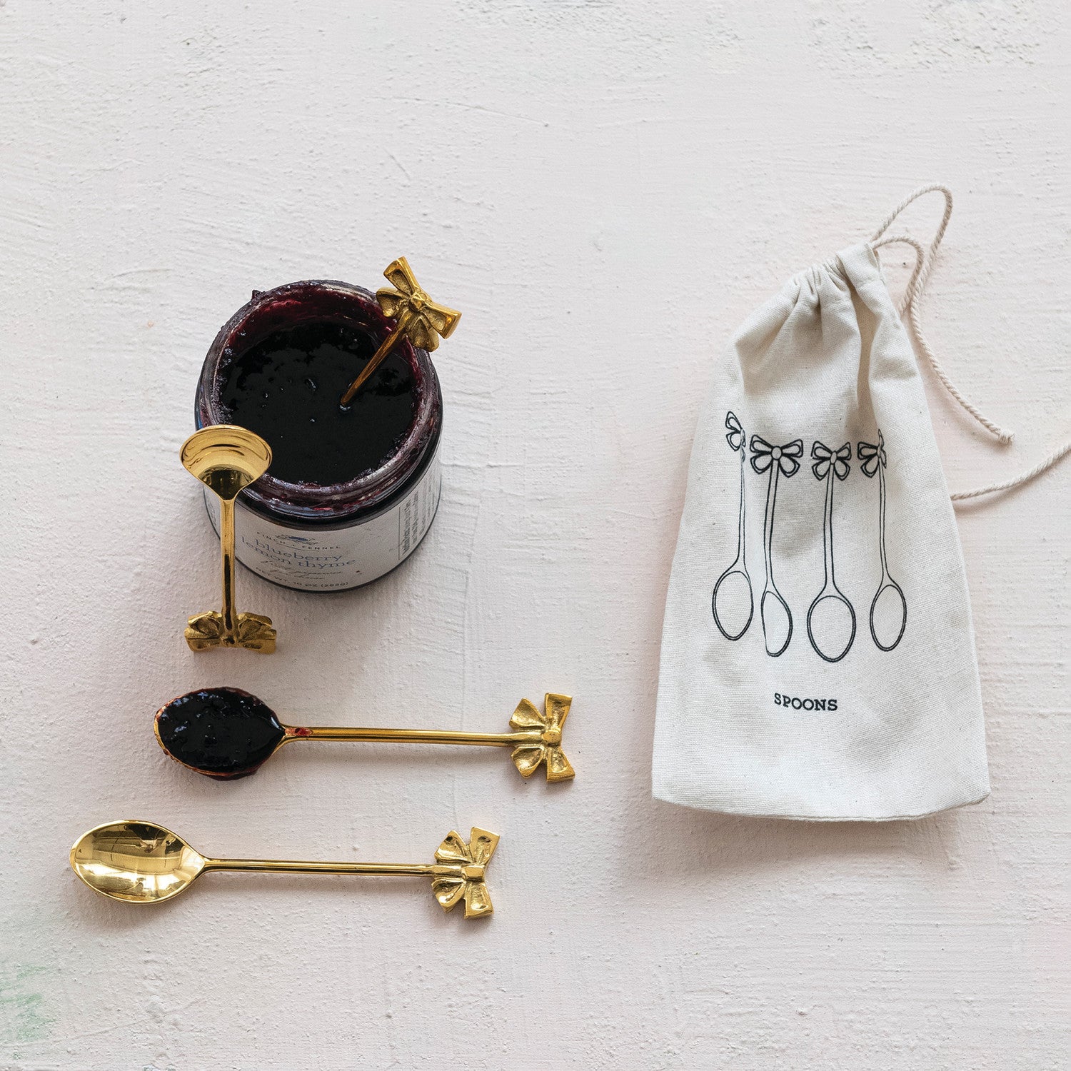Bow Shaped Brass Spoon